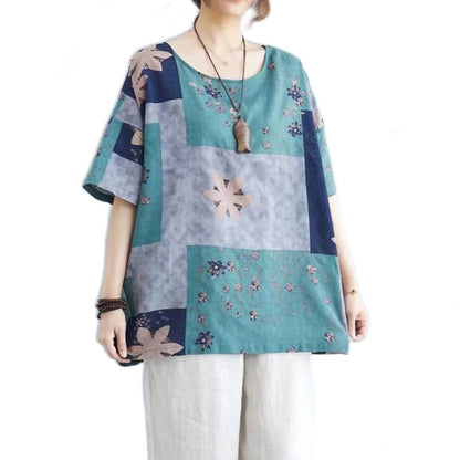 Stylish loose-fit floral print t-shirt in greyish purple, green, and navy blue colours