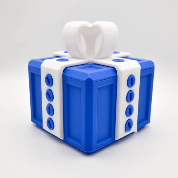 Clever Gag Gift Box - Unique 3D printed design in various colors with a humorous "trouble" concept for prank gifts and creative holiday presents
