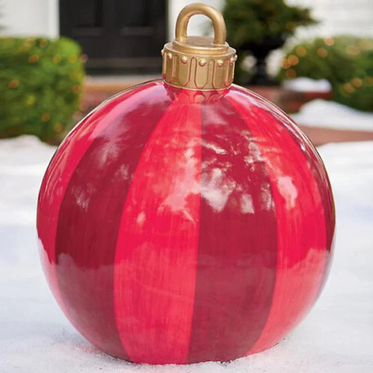 Vibrant inflatable Christmas baubles in a variety of colours and patterns, perfect for outdoor holiday decoration