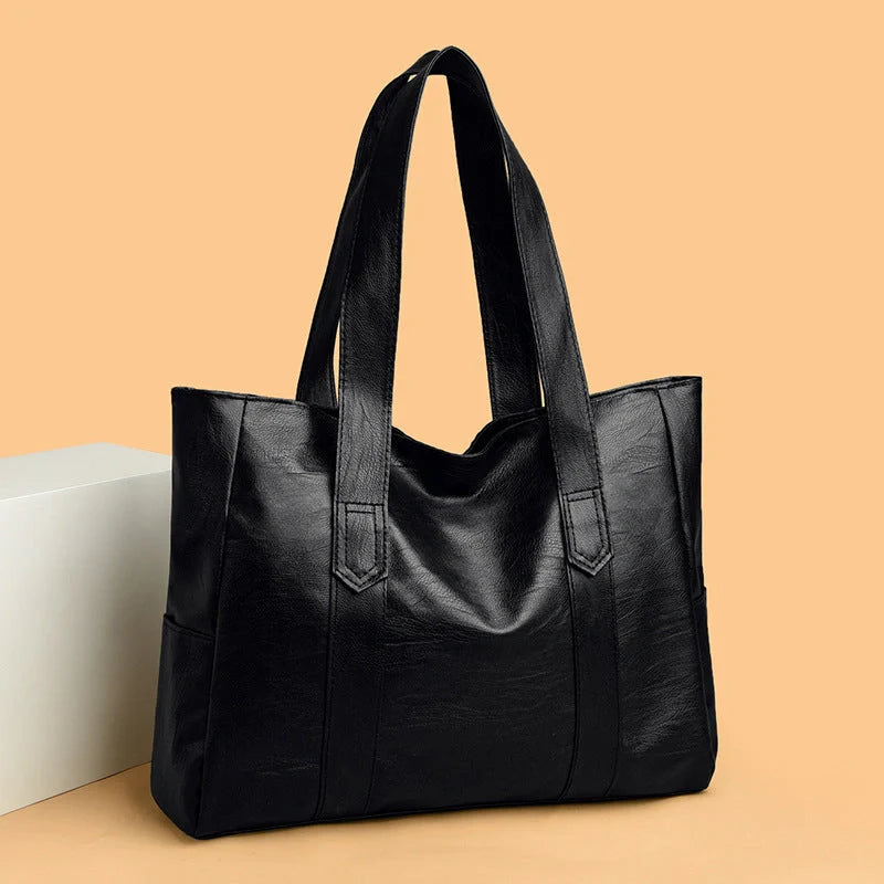 Stylish large capacity commuter shoulder bag in brown and black for autumn and winter