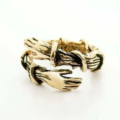 Elegant Adjustable Love Hands Embracing Ring in gold and silver, a perfect symbol of affection