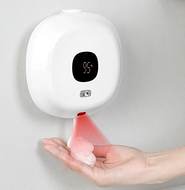 Smart sensor wall-mounted soap dispenser in white and blue, featuring contactless operation and temperature sensing