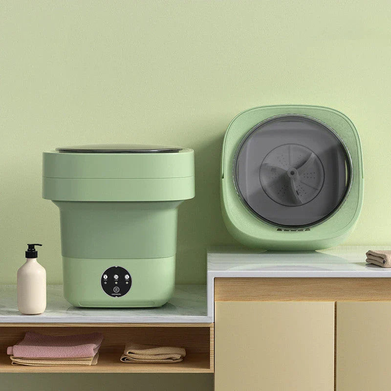 Compact folding washing machine for small spaces and travel, featuring a lightweight, portable design with powerful cleaning capabilities