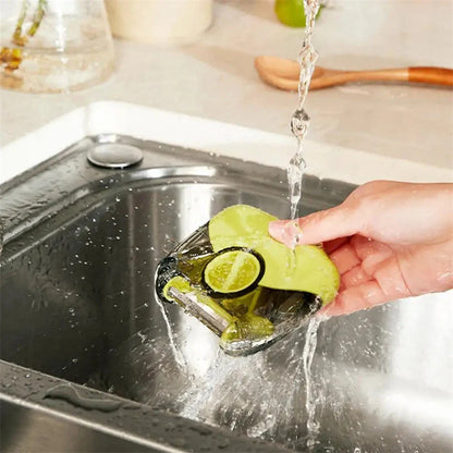 3-in-1 Stainless Steel Peeler Shredder in green and grey with ergonomic handle