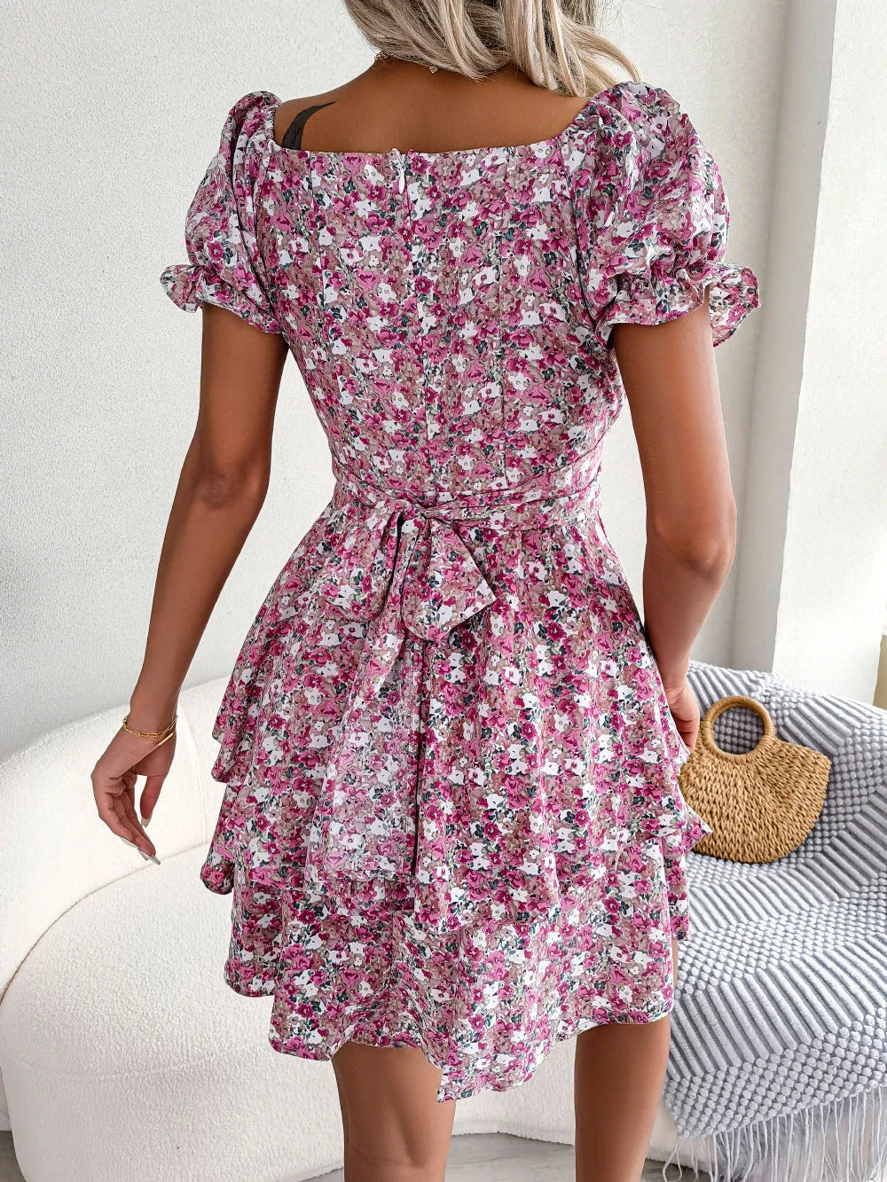 Stylish floral mini dress with A-line silhouette, high waist, and ruffled hem in various vibrant colors