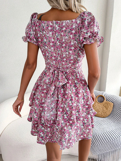 Stylish floral mini dress with A-line silhouette, high waist, and ruffled hem in various vibrant colors