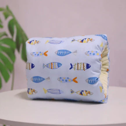 Adjustable baby nursing arm pillow in various colors and patterns, including dark blue, gray, pink, and more. Features soft, breathable cotton fabric and an ergonomic design to support breastfeeding mothers.