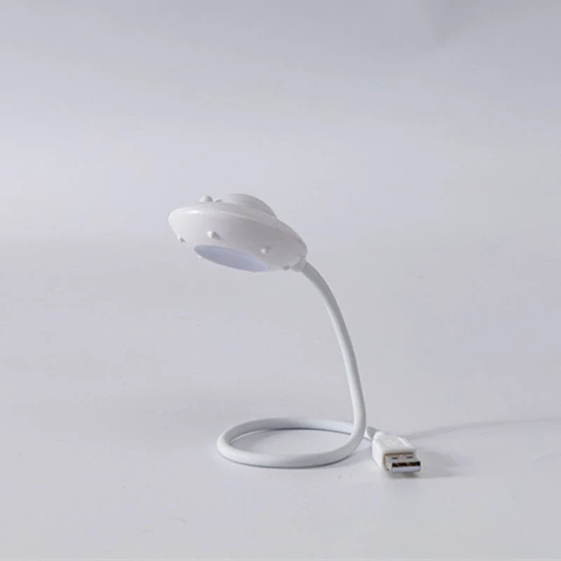 USB Astronaut LED Night Light with flying saucer design, white color, compact size