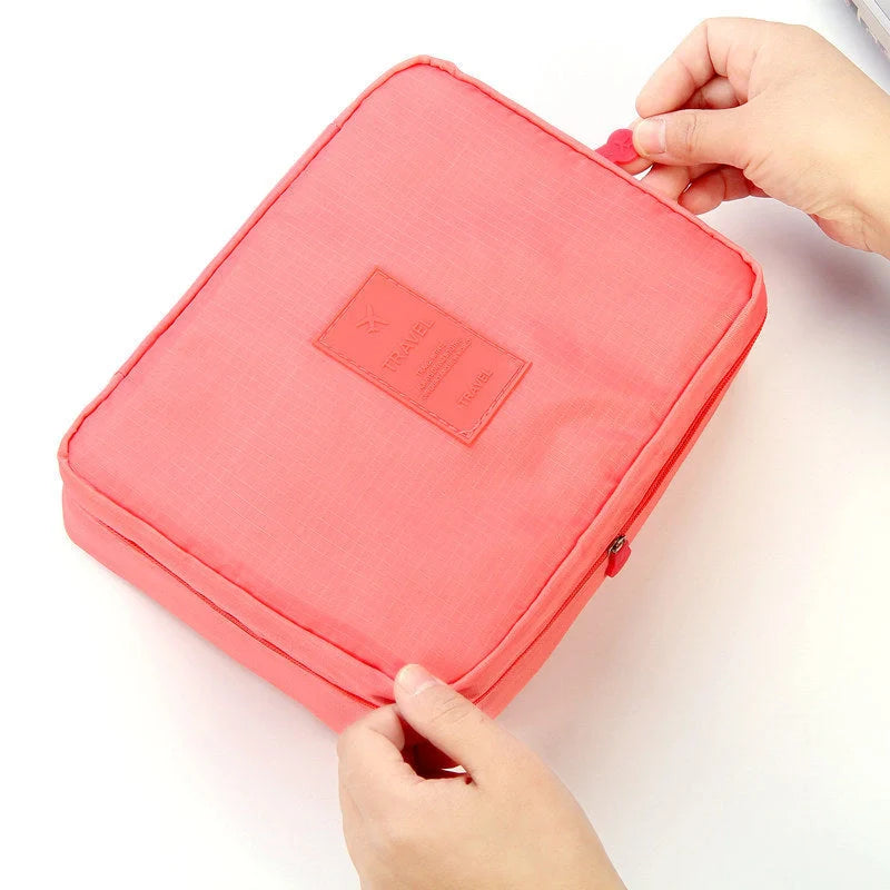Premium toiletry bag with waterproof divider, multi-grid pockets, and durable Oxford cloth construction