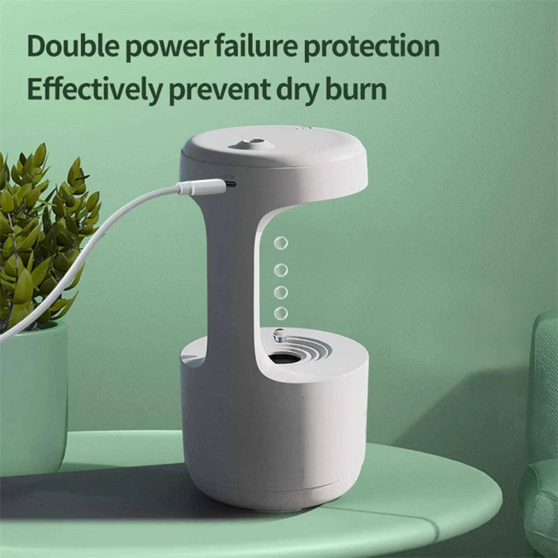 Anti-gravity humidifier with LED display and aroma diffuser in white, green, and black