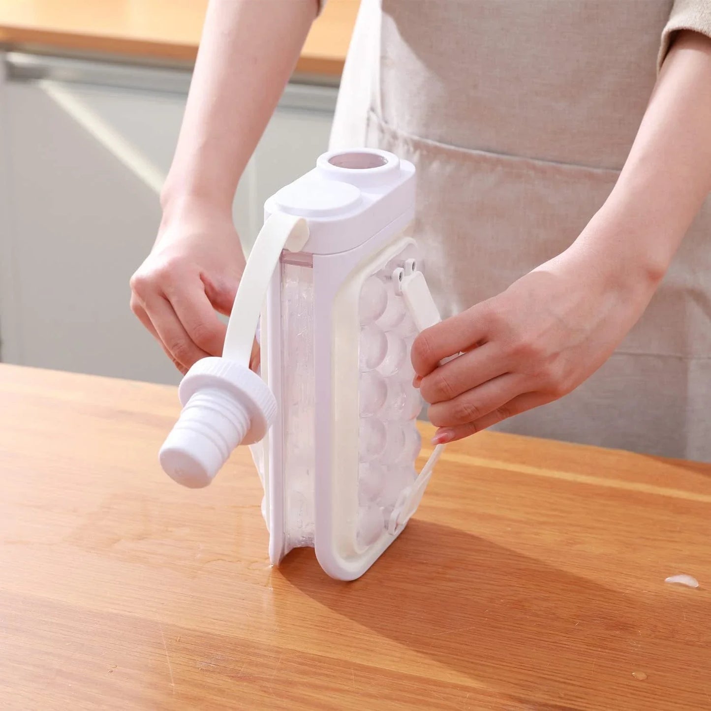 A convenient 2-in-1 kitchen gadget that creates ice balls and chills beverages, made with durable BPA-free materials for easy cleaning and odor resistance.