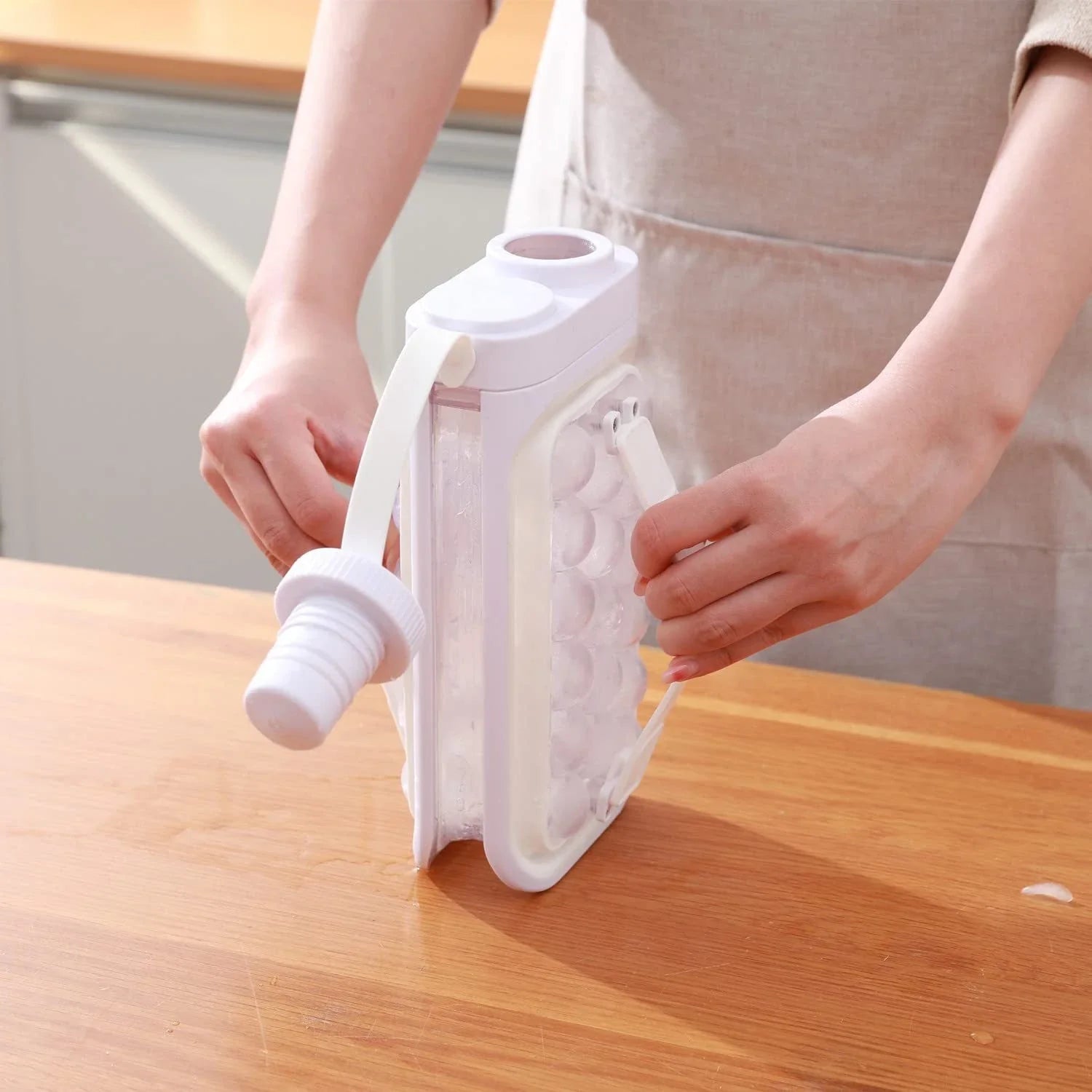 A convenient 2-in-1 kitchen gadget that creates ice balls and chills beverages, made with durable BPA-free materials for easy cleaning and odor resistance.