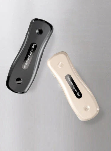 Compact USB mini sealing machine for kitchen food preservation in black and milky white