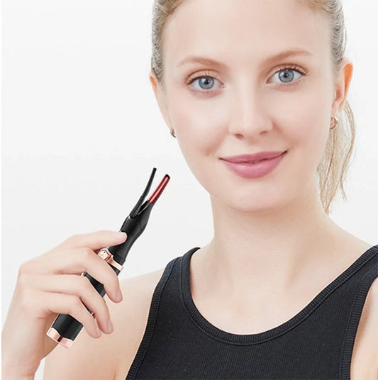 Rechargeable electric eyelash curler with 360-degree rotating comb and USB charging