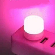 Compact USB LED night light with soft glow for reading and sleep