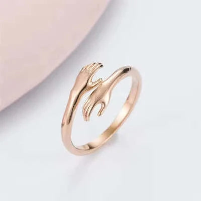 Adjustable Alloy Hands Hug Ring in silver and gold, stylish unisex jewelry