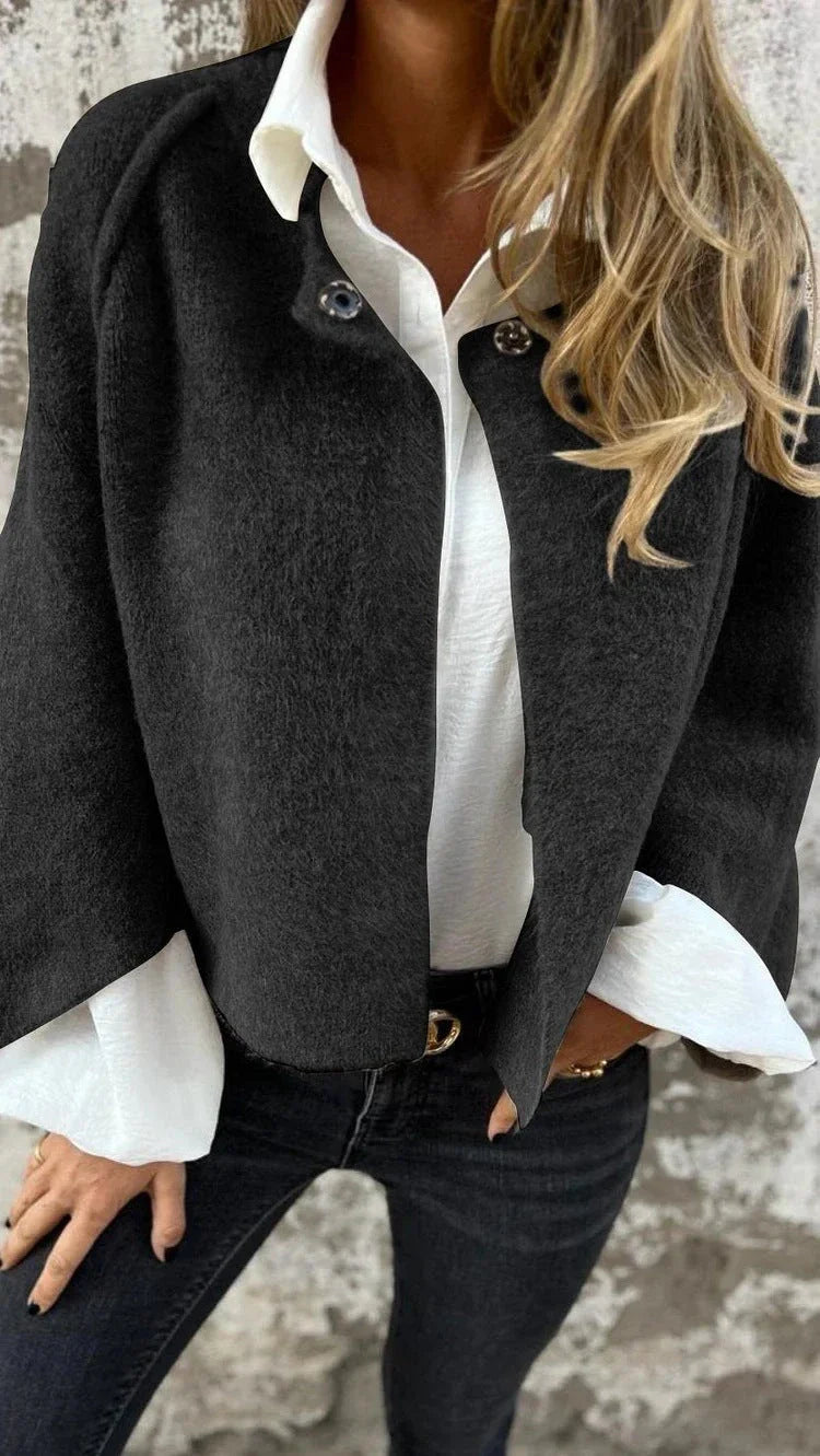 A stylish and comfortable batwing sleeve cardigan made with luxurious imitation cashmere fabric, available in a variety of colors.