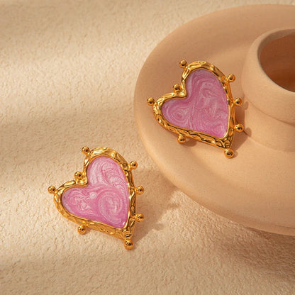 Elegant stainless steel heart-shaped earrings in a range of captivating colours, perfect for adding a touch of romantic flair to any outfit.