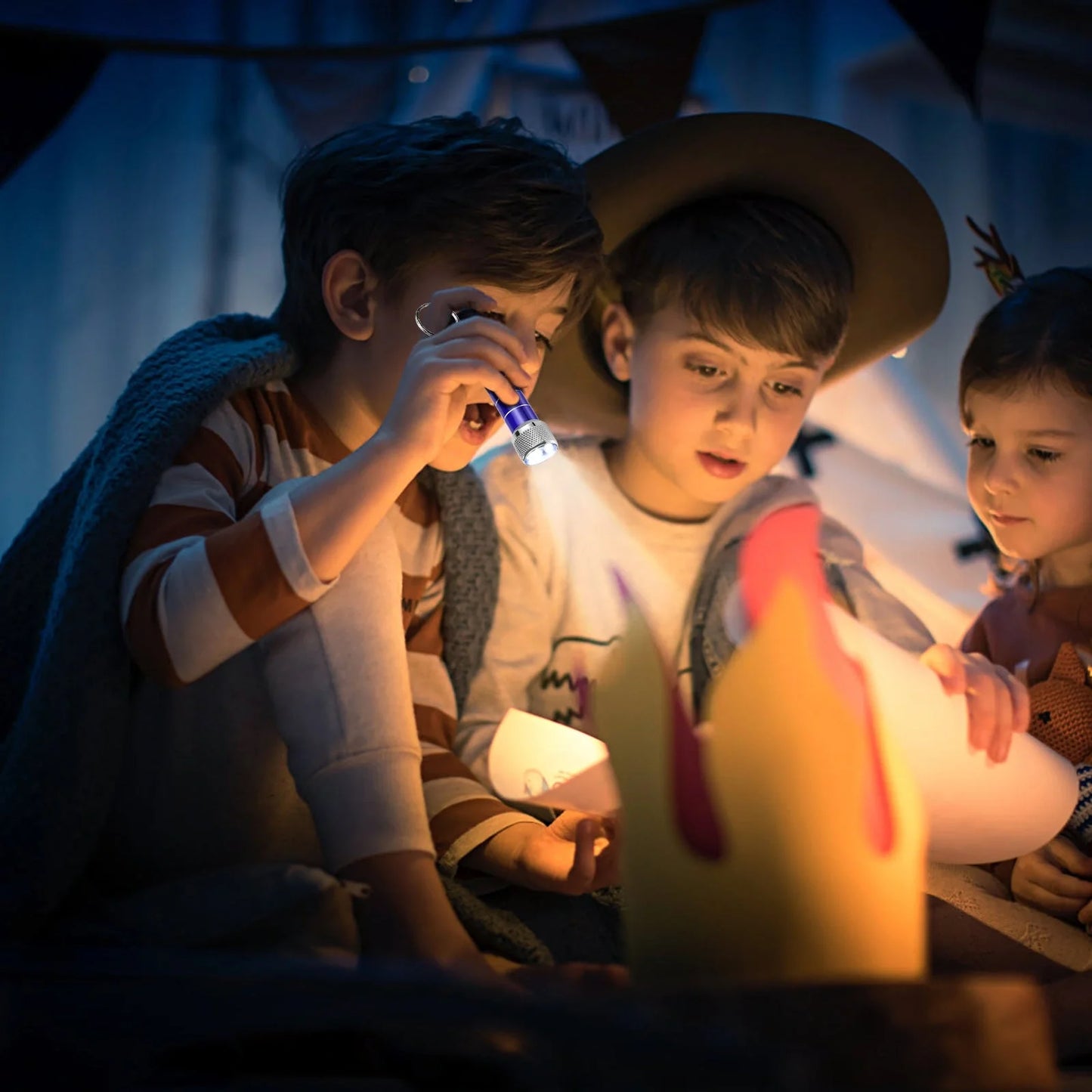 Compact LED keychain torch in four colours for emergencies and camping