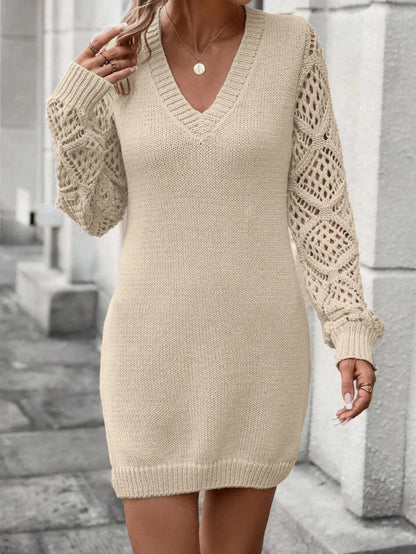 V-neck knitted dress in viscose-polyester blend, available in white, apricot, black, and beige.