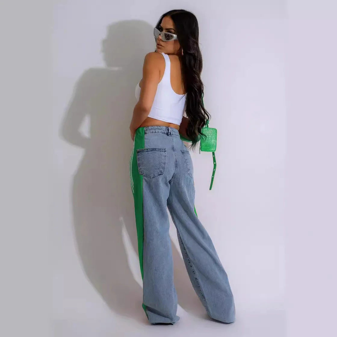 Stylish high-waist denim pants with patchwork details, available in a range of trendy color combinations