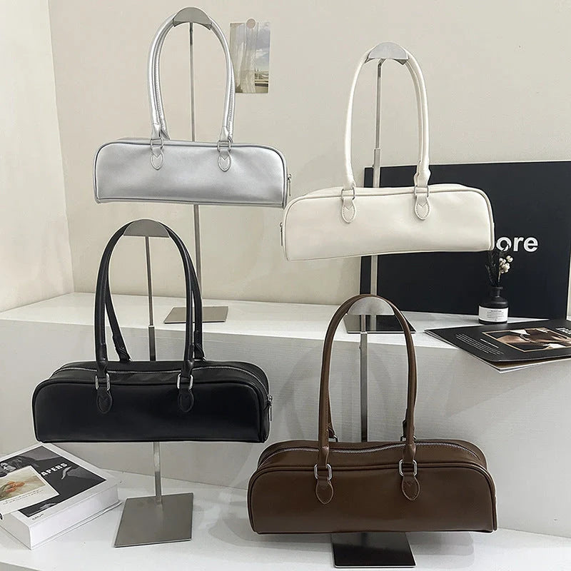 Stylish retro PU women's stick bag in white, silver, black, and brown for leisure and daily use