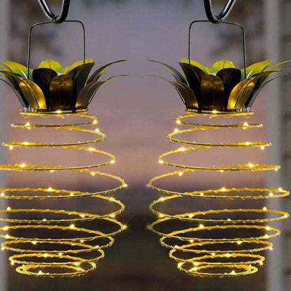 Elegant solar-powered garden lights with a whimsical pineapple design, automatically lighting up from dusk till dawn