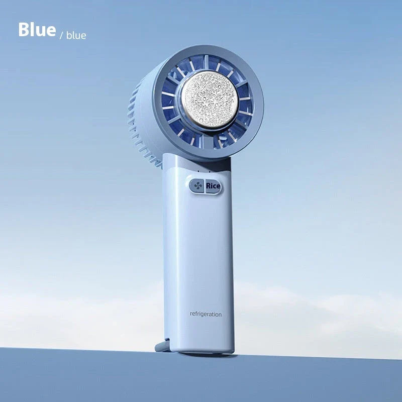 Powerful and portable handheld turbo fan with ice-cooling function for refreshing summer comfort