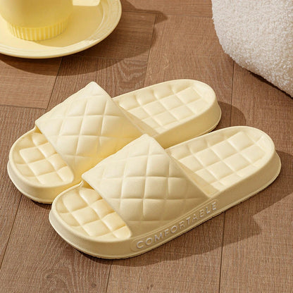 Cozy plaid indoor slippers with soft, silent, and waterproof EVA construction for comfortable all-day wear
