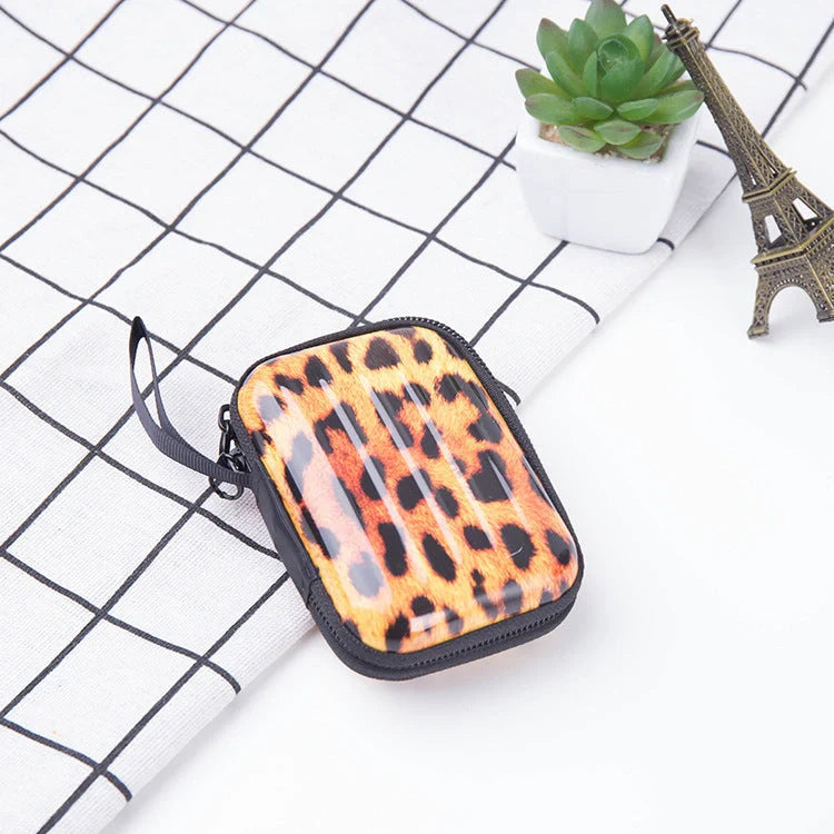 Tinplate coin purse with anime-inspired cartoon graphics, available in various stylish designs