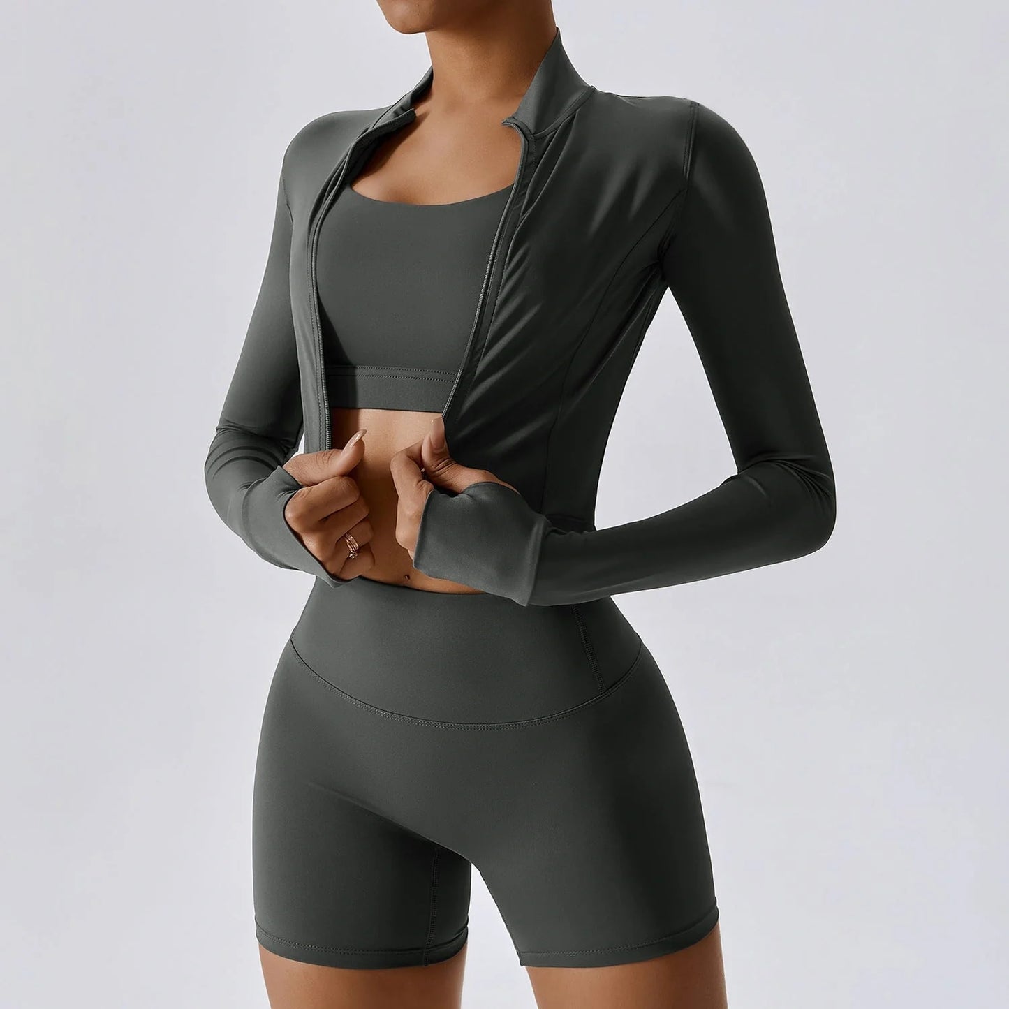 Premium activewear set in various colours, including black, blue, green, and magenta. The set features a sleek and streamlined design for optimal performance and comfort during outdoor sports and yoga.