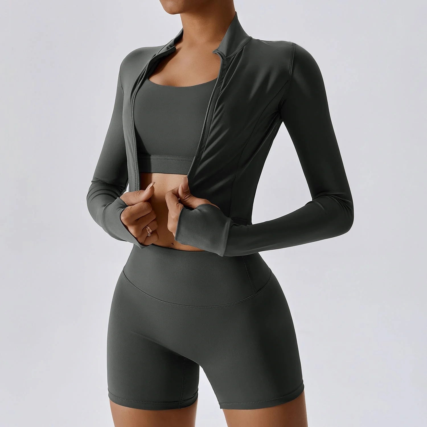 Premium activewear set in various colours, including black, blue, green, and magenta. The set features a sleek and streamlined design for optimal performance and comfort during outdoor sports and yoga.