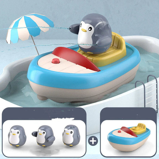 Toddler bath toys featuring an electric boat and three penguin sprinklers for fun bath time