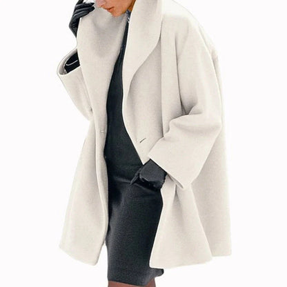A stylish woollen coat in a variety of vibrant colours, perfect for the autumn and winter seasons.