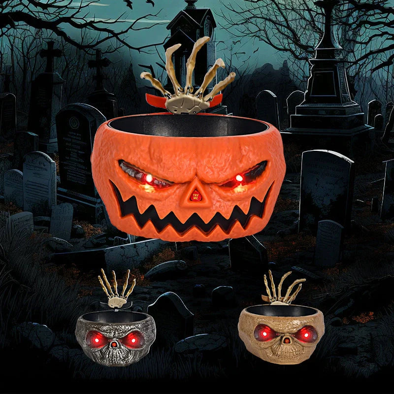 Motion-activated Halloween pumpkin candy bowl with spooky skeleton hand and glowing red eyes
