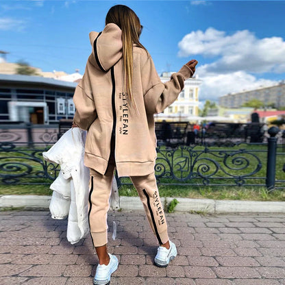 A stylish long hoodie jumpsuit in a variety of sophisticated colours, featuring a flattering silhouette and premium materials for all-day comfort.