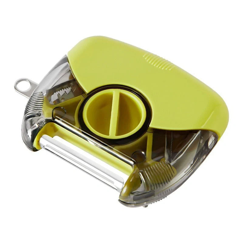 3-in-1 Stainless Steel Peeler Shredder in green and grey with ergonomic handle
