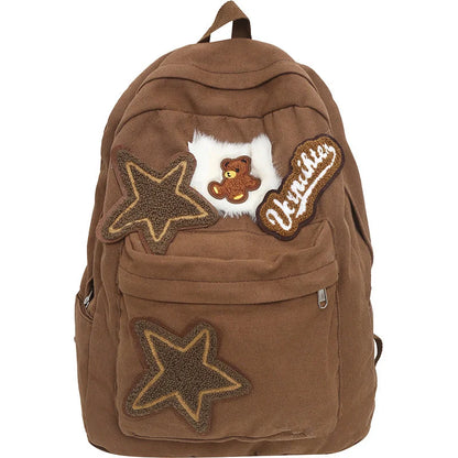 A stylish and durable canvas backpack with geometric patterns, designed for female college students
