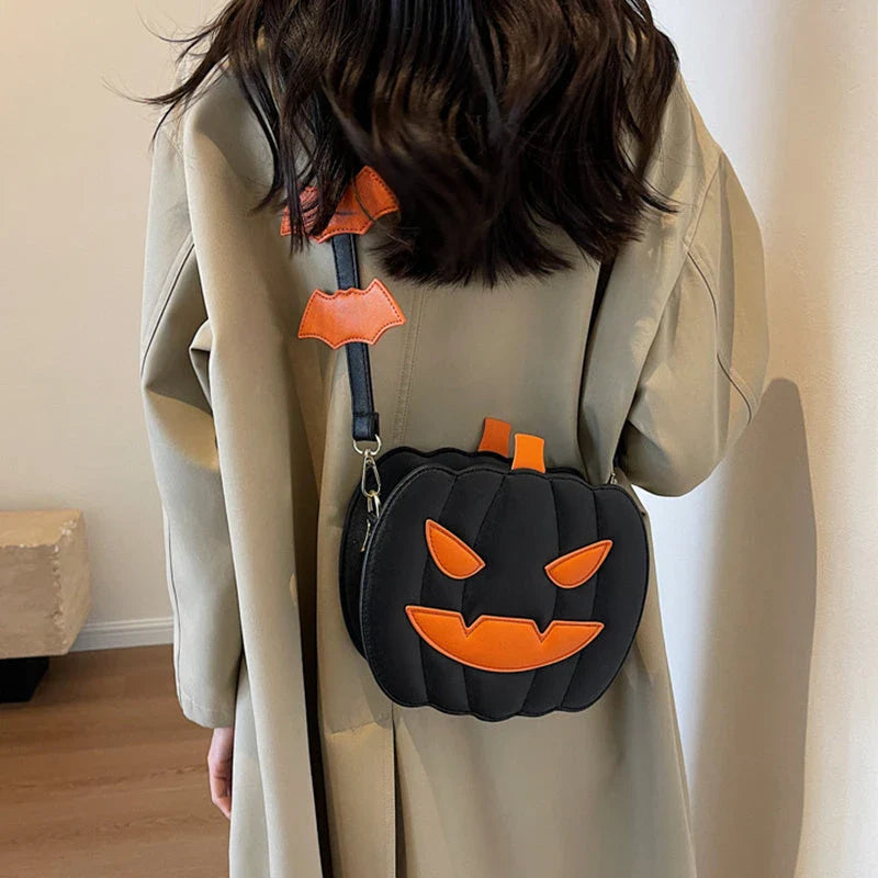 Stylish Halloween shoulder bag with pumpkin cartoon and bat design, available in various color options