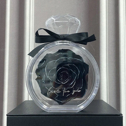 Preserved Rose Flower Ornaments in various colors, including red, pink, plum, and sapphire blue, displayed in a stylish gift box.