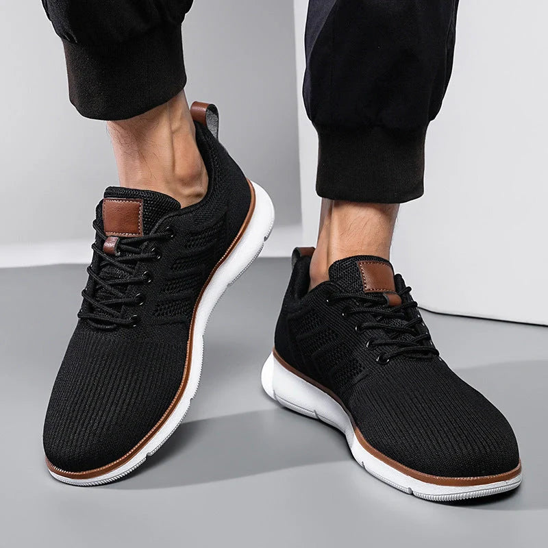 Men's black lace-up mesh sneakers with round toe design