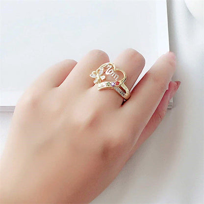 Elegant rhinestone heart-shaped ring in gold color with a dazzling array of multicolored rhinestones