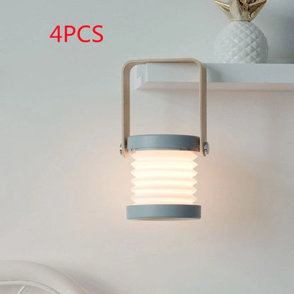 Elegant foldable LED lamp with touch-controlled dimming, rechargeable battery, and modern design for home decor