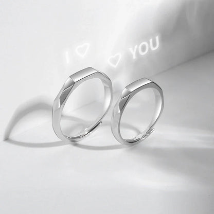 Stylish sterling silver rings with a hidden love pattern design, perfect for romantic gifts or personal accessorizing.