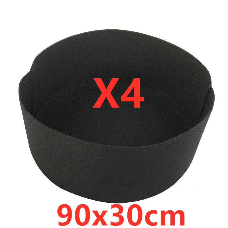 Round black and green fabric grow bags for garden plants with automatic drainage