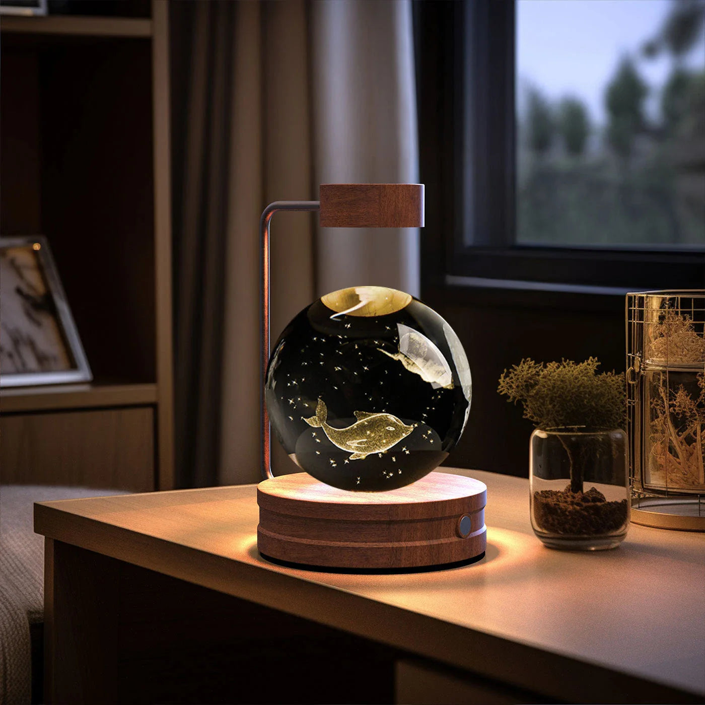 Enchanting crystal ball night light with cosmic designs, creating a warm and soothing ambiance in any room.