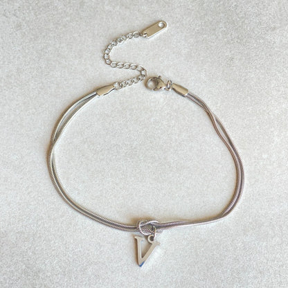 Personalised gold and silver love knot bracelets for couples, perfect as Valentine's Day gifts.