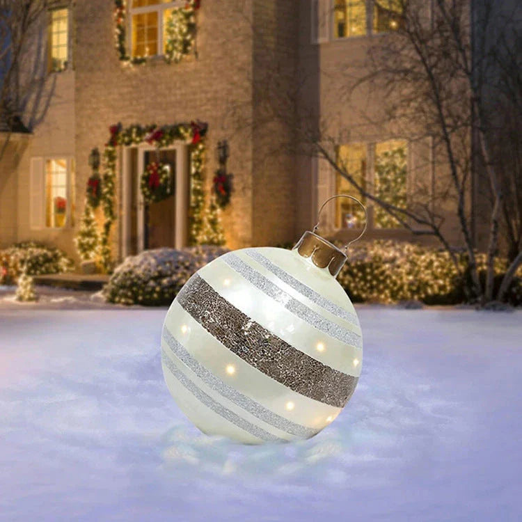 Inflatable Christmas baubles in various festive designs for outdoor holiday decoration