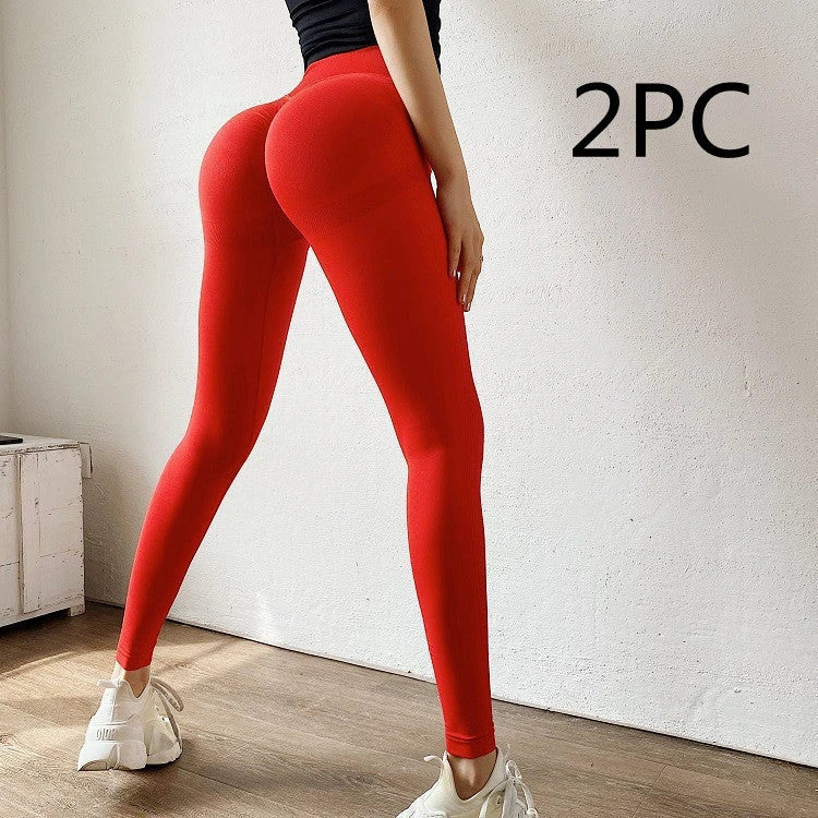 Curve-Enhancing Yoga Pants in various colors, including pink, red, black, blue, yellow, orange, green, dark gray, and light gray
