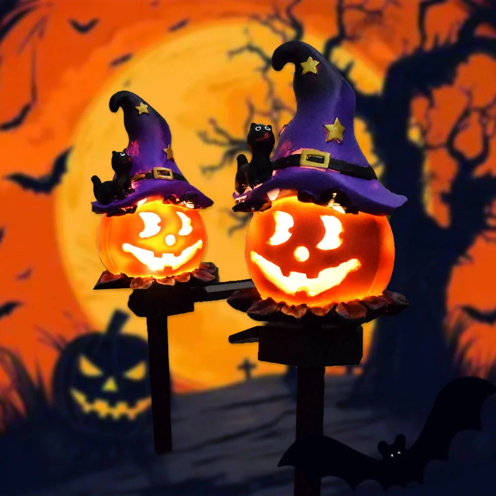 Solar-powered Halloween pumpkin lanterns in garden setting